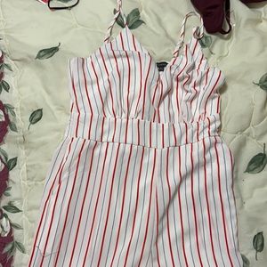 Red white black striped jump suit